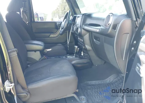 2015 Jeep Wrangler Unlimited Sport from USA, damaged, VIN 1C4BJWDG2FL518487